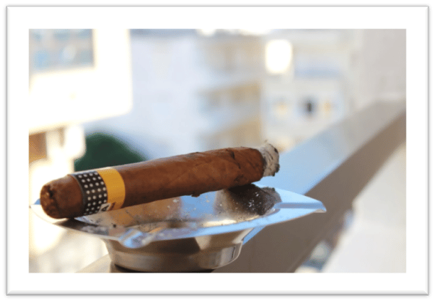 Gain style points and look like a pro by learning how to light a cigar the right way.