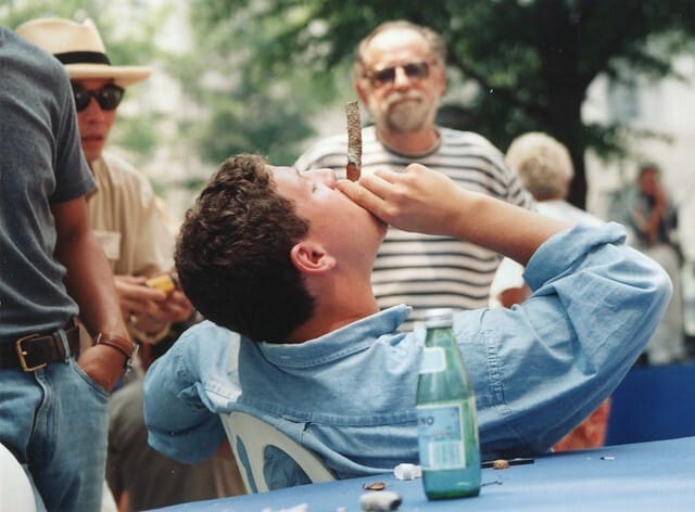 A man smoking during a cigar ritual