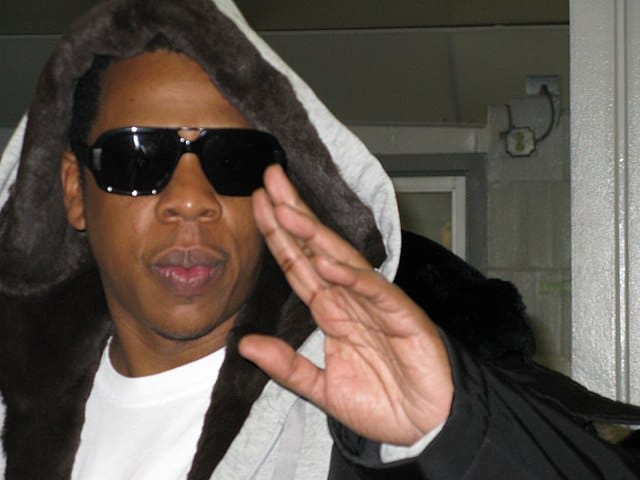 Jay-Z pictured here enjoys both cigars and music.