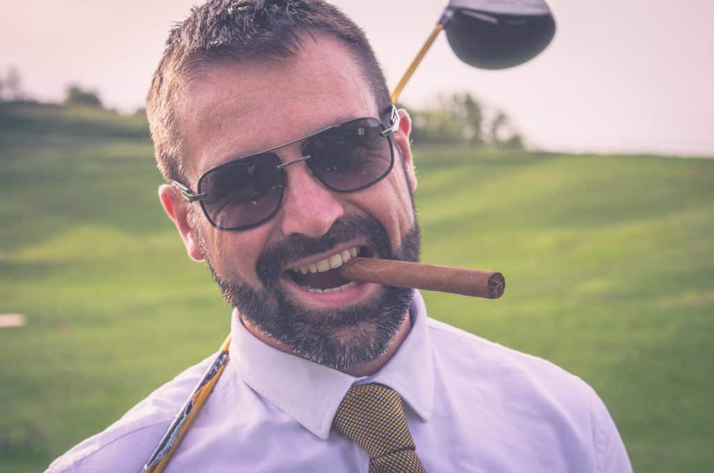 A man smoking a cigar