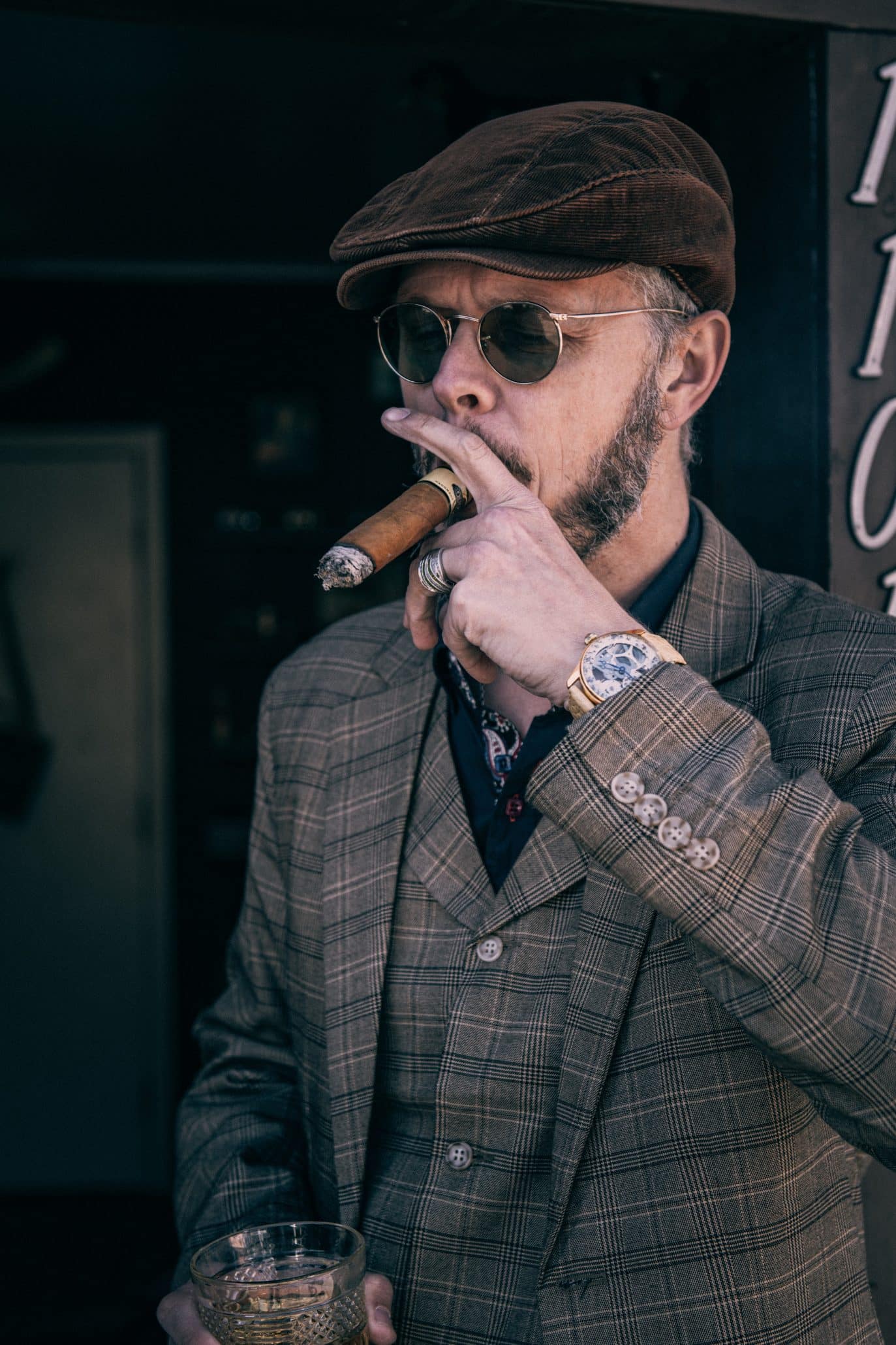 A man smoking a premium cigar