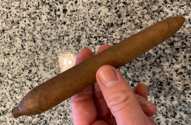A distinctly shaped figurado cigar