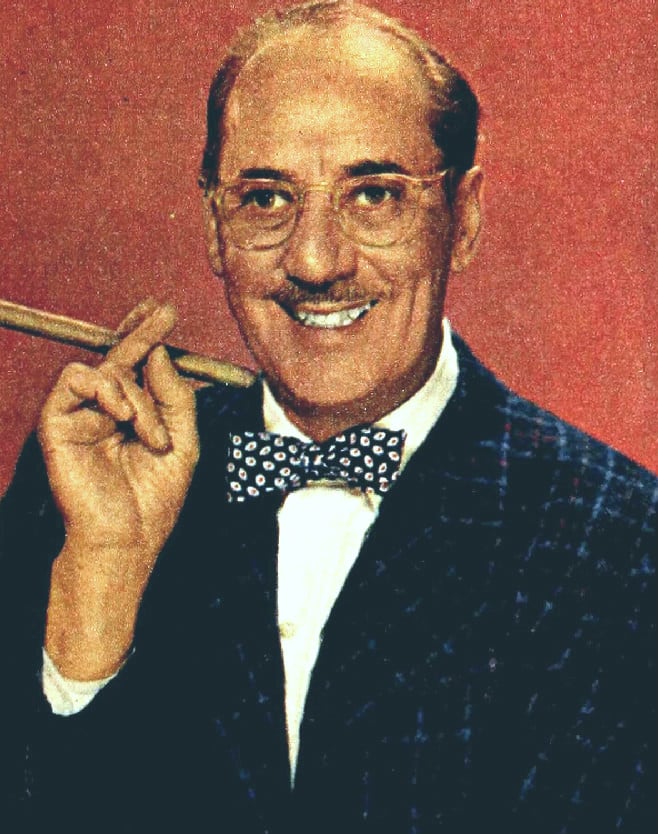 Groucho Marx holding a cigar