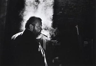 Orson Welles smoking a cigar