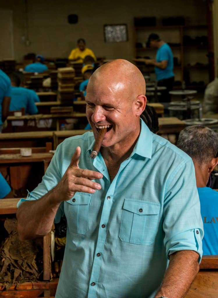 Luis Cuevas, of Casa Cuevas, smoking a cigar.