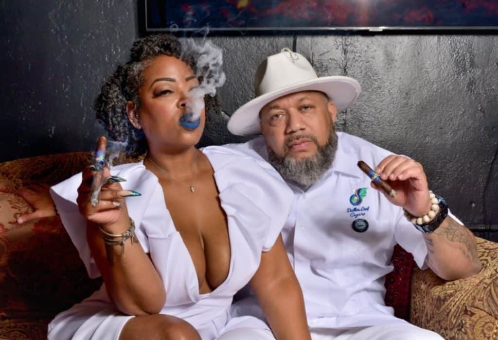 Ron Smith of Dallas Leaf LLC pictured smoking a cigar with wife, Chere.