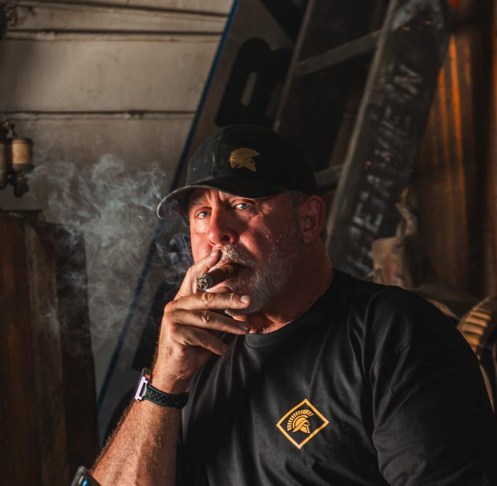Steve Bartell smoking a cigar